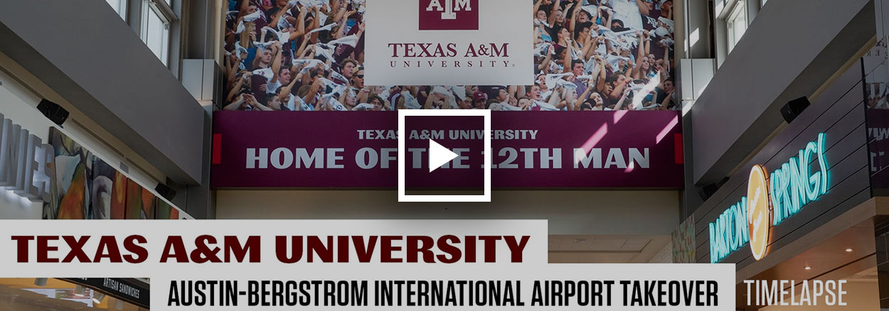 watch video of tamu billboard being installed at Austin-Bergstrom Airport 