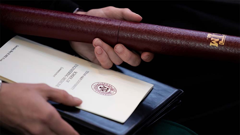 Diploma and commencement program from Texas A&M University