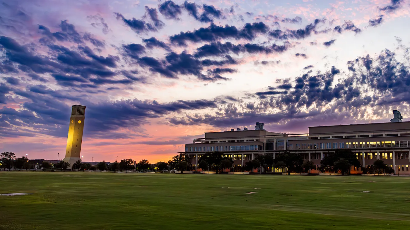 Striking sunset on the Texas A&M campus behind the bell tower